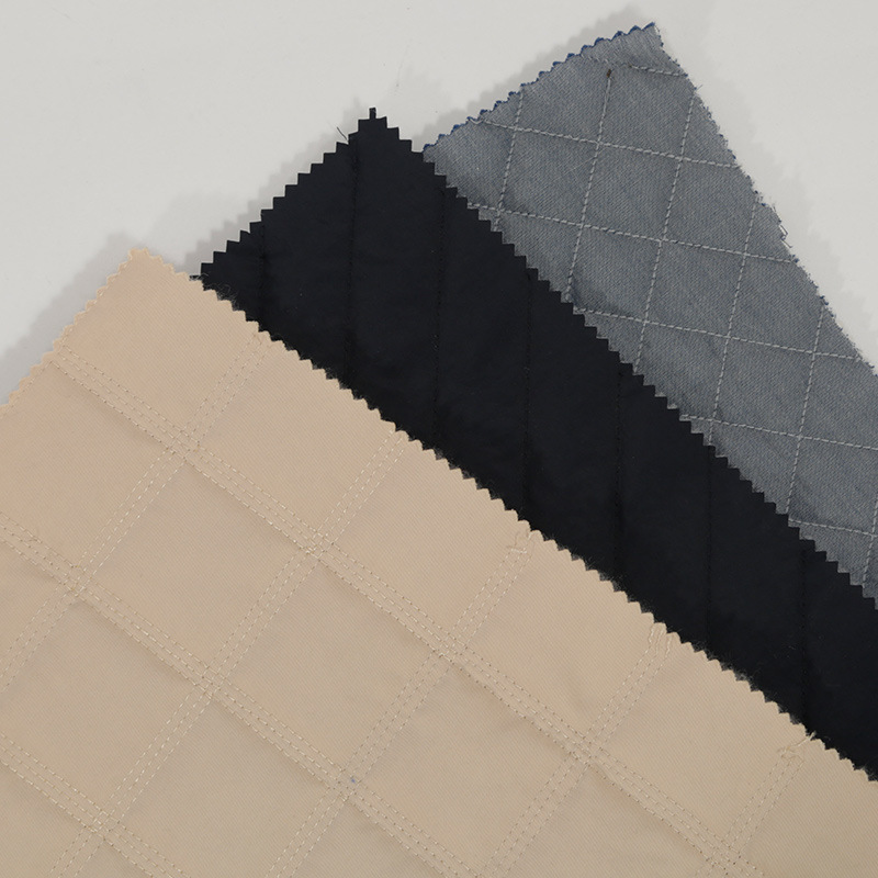 潮流绗绣绗棉面料 厂家批发 品质加棉菱形棉服服装面料 现货直供