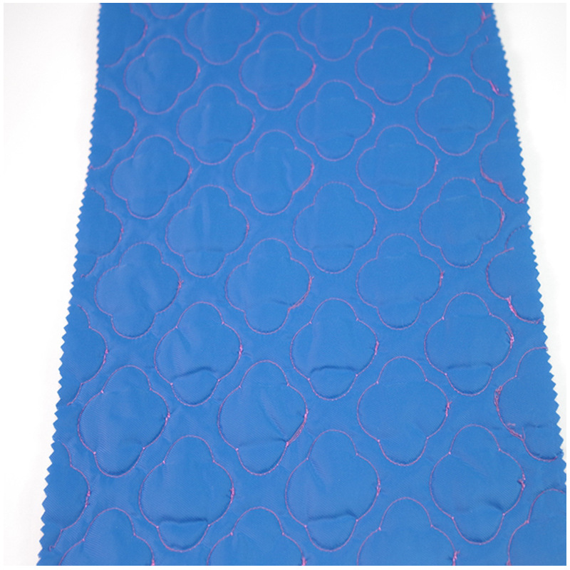 秋冬平纹双面梅花绗绣夹棉防火阻燃涤丝纺电脑绣花面料