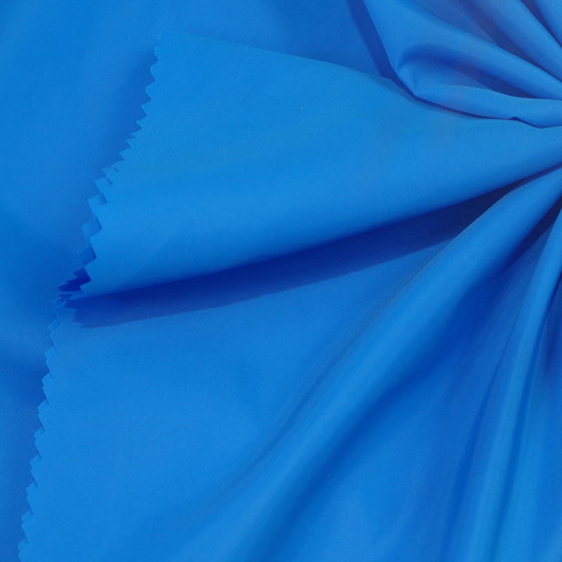 厂家现货供应高品质涤塔夫绸布料羽绒服里料服装印花素色全