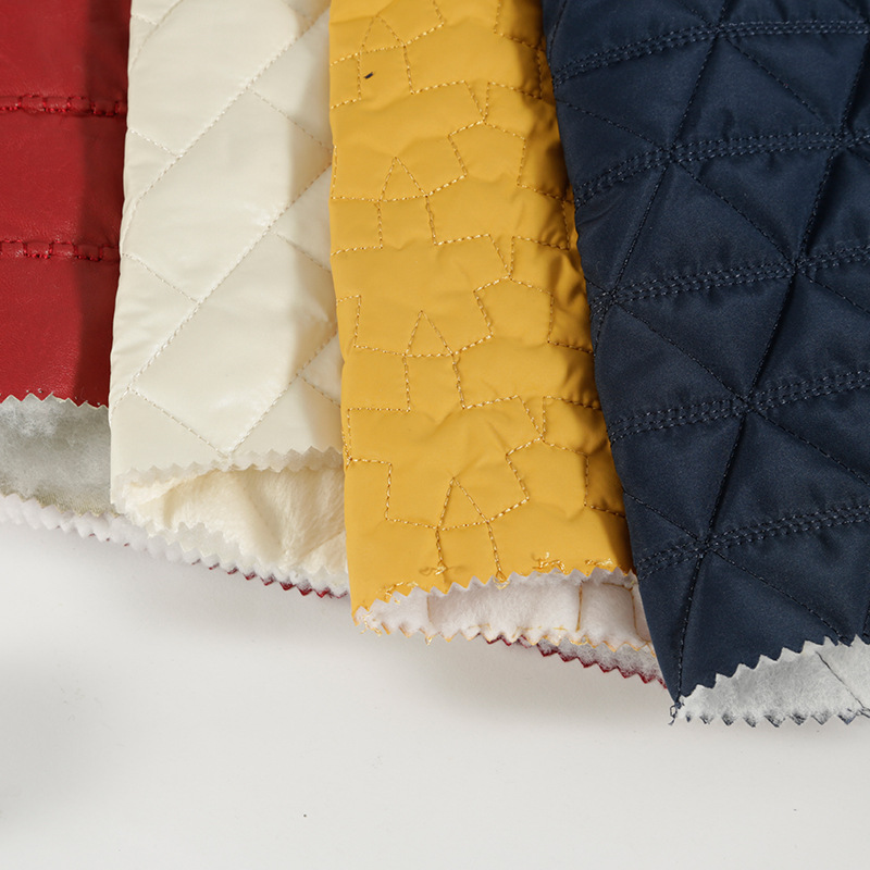 厂家直供菱形格绗绣绗缝面料批发 防水双层棉袄时装刺绣布料