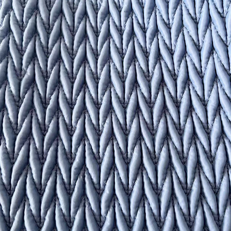 牛筋弹力绣面料棉服辅料立体绣花绗缝夹棉包秋冬绣花面料裥