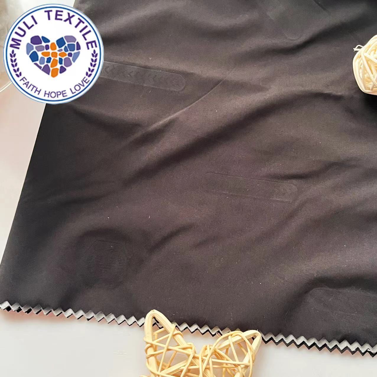 400t春亚纺超压全消光印花充绒羽绒服面料三防面料涤纶面料染色布