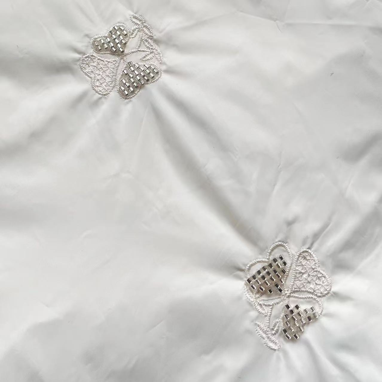 定制羽绒服三合一直充绒面料珠管三次绣花涤纶充绒半成品防水防风