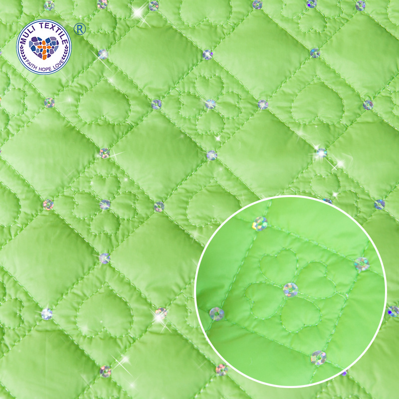 亮片夹棉绗缝布料 棉服刺绣面料电脑绣花厂 羽绒服面料绗绣批发