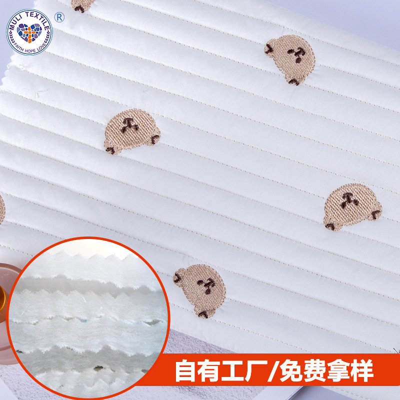 纯棉刺绣绗棉羽绒服面料布横条夹棉布小熊全棉加厚绗绣绗缝面料