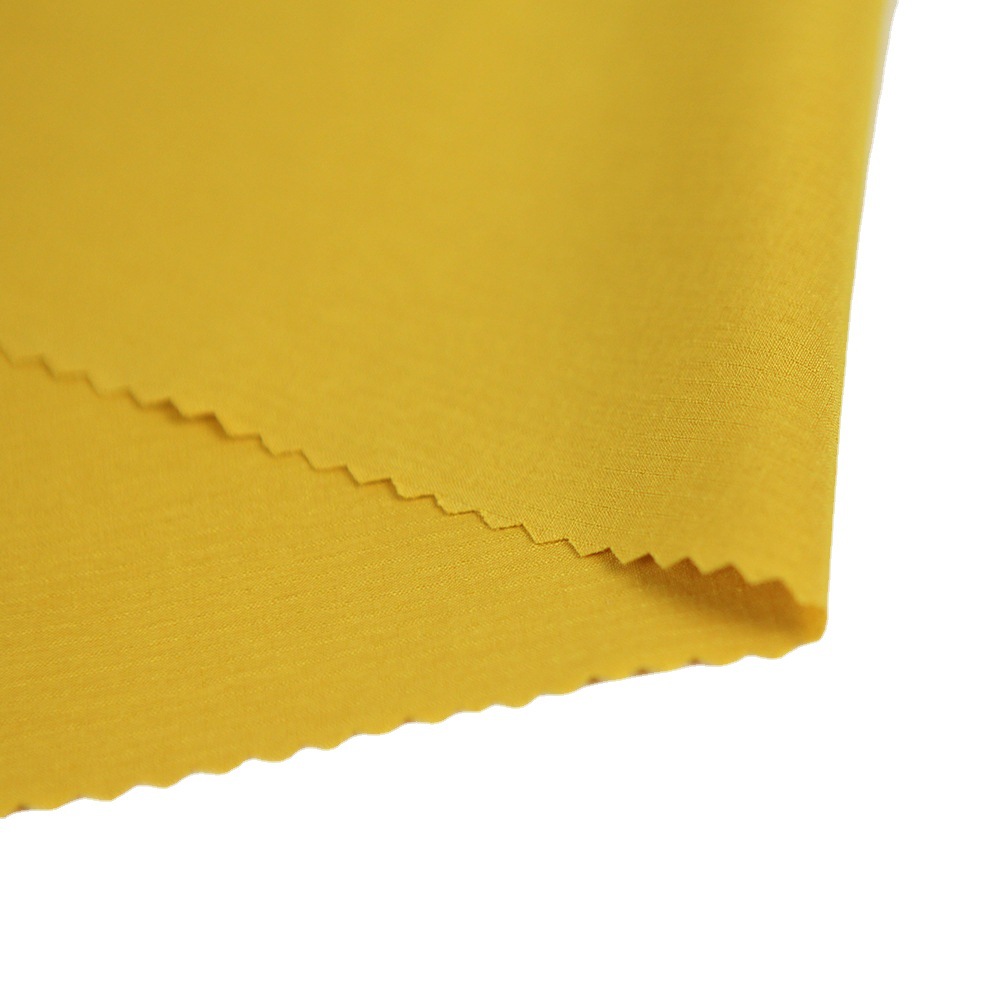 75D阳离子面料 涤纶四面弹双线格 春夏季裤装工作服时装面料