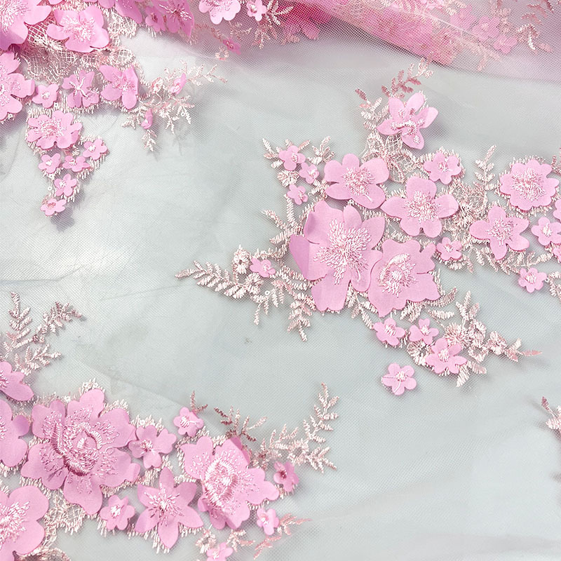 定制2025年春夏新款绣花面料激光绣花刺绣布连衣裙童装面料舞台服