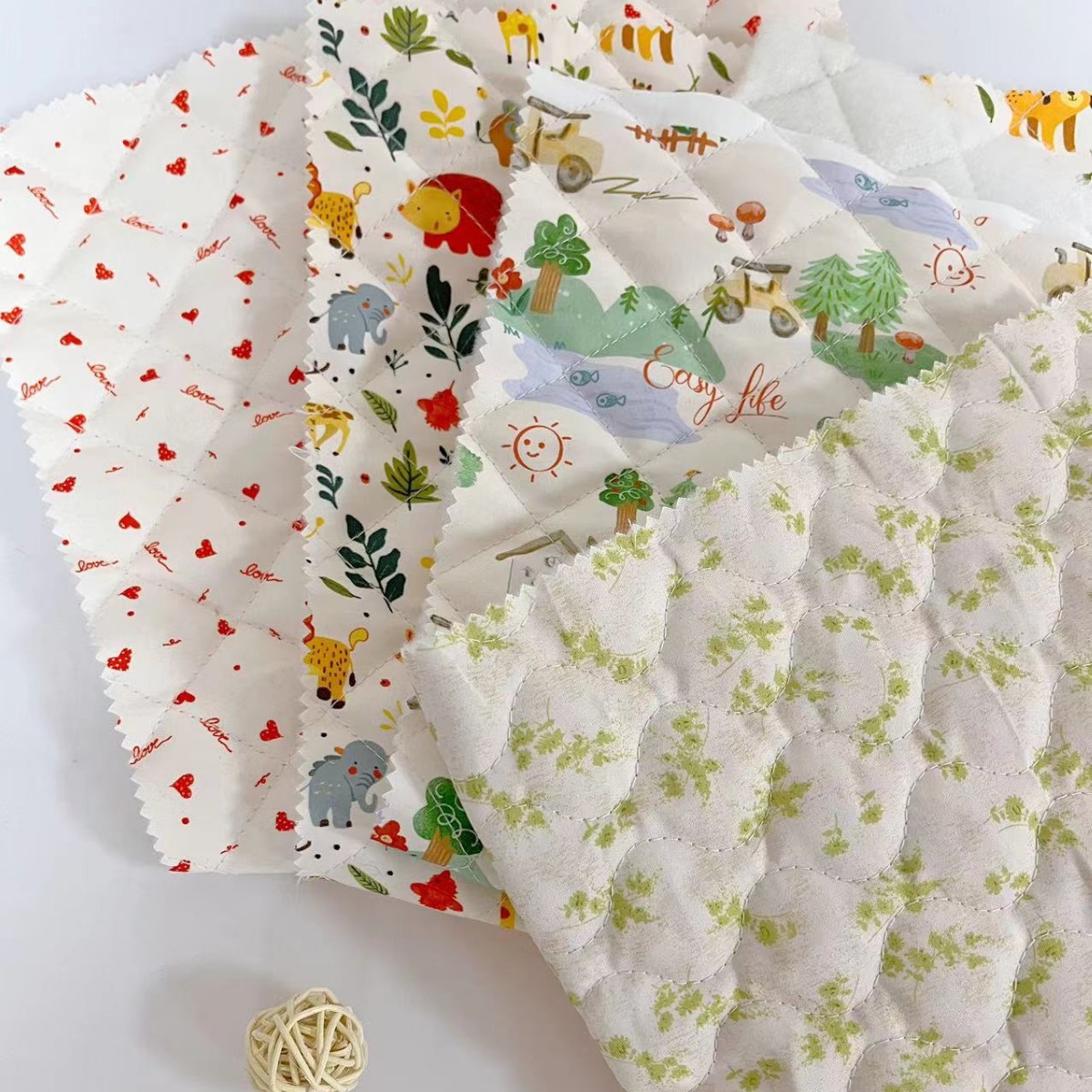 数码印花绗缝棉布料绗棉面料儿童服装云朵包箱包夹棉布料秋冬保暖