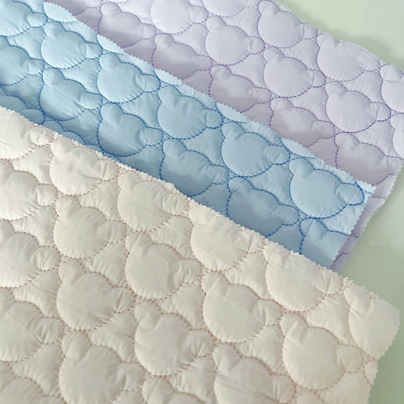 绗缝棉布料衍缝小熊头绗绣童装布绣花布云朵包花边面料夹