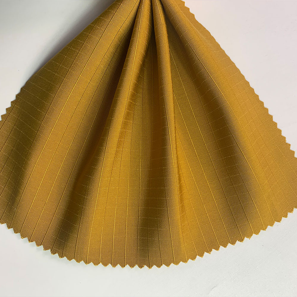 0.5cm正方格提花 棉服羽绒服裤装时装面料 秋冬涤纶面料 现货