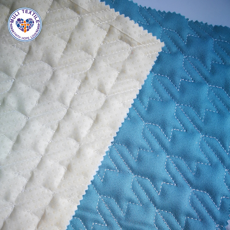 工厂直销 荷兰绒 千鸟格绗缝夹棉 防滑 烤火罩 沙发垫布料批发