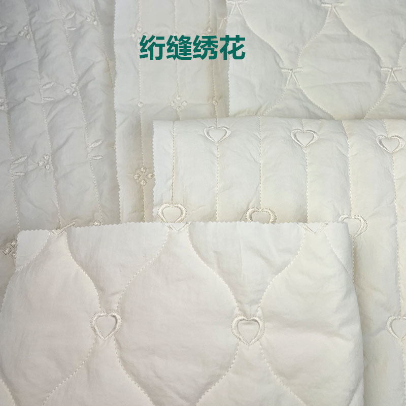 定制特种绗绣绗缝棉布料夹棉包面料绣花布云朵包服装面料童装宠物