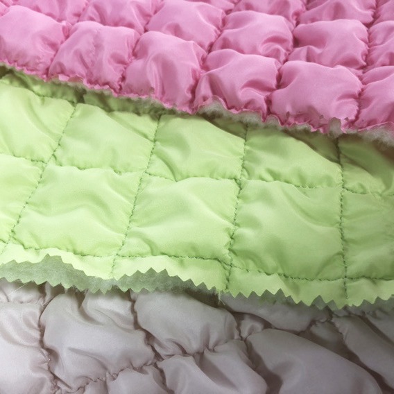 弹力牛筋线网红云朵包绗棉面料 绗绣起泡收缩布料 绍兴绗缝