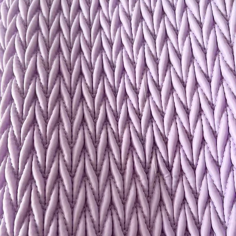 牛筋弹力绣面料棉服辅料立体绣花绗缝夹棉包秋冬绣花面料裥