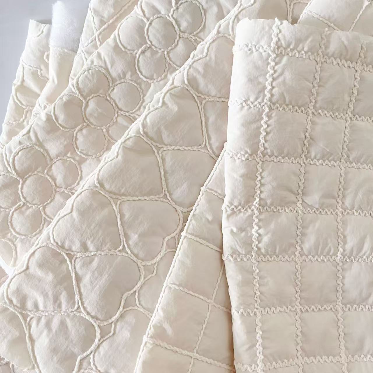 绳绣加粗线绗缝夹棉布立体绣花布云朵包服装夹克面料刺绣布绗绣