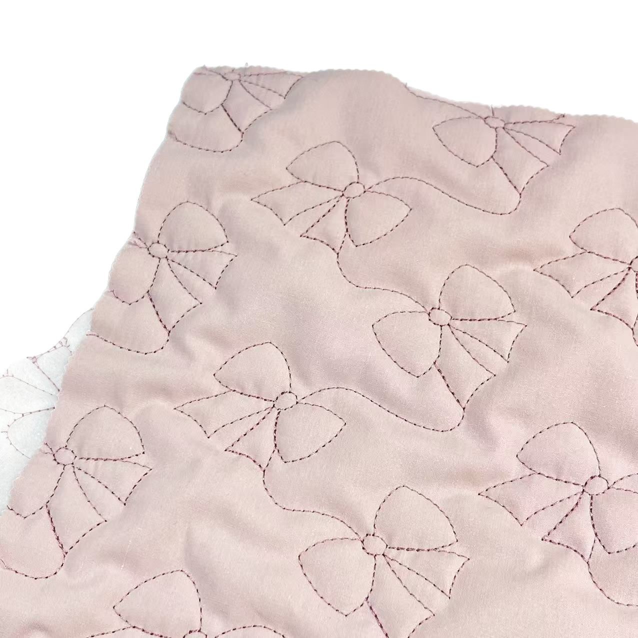 蝴蝶结绗绣绗缝夹棉包面料绗棉绣花面料箱包衣服布衍缝棉布料