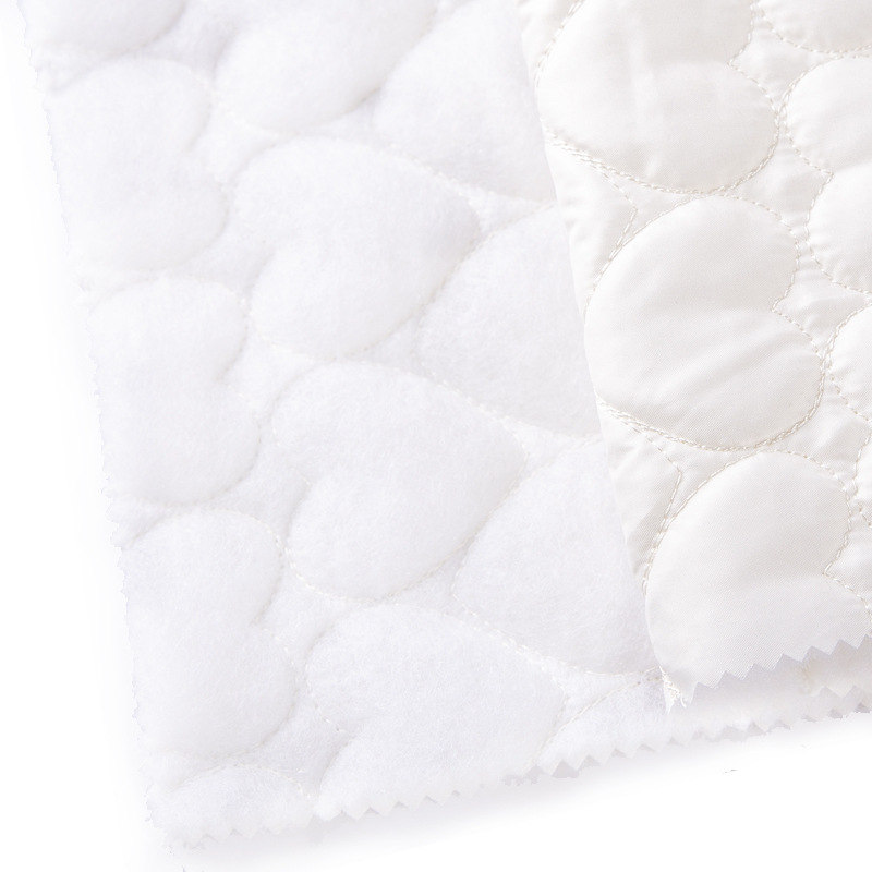 厂家直供尼丝纺爱心绗棉夹棉面料秋冬绗缝羽绒外套云朵包面料批发