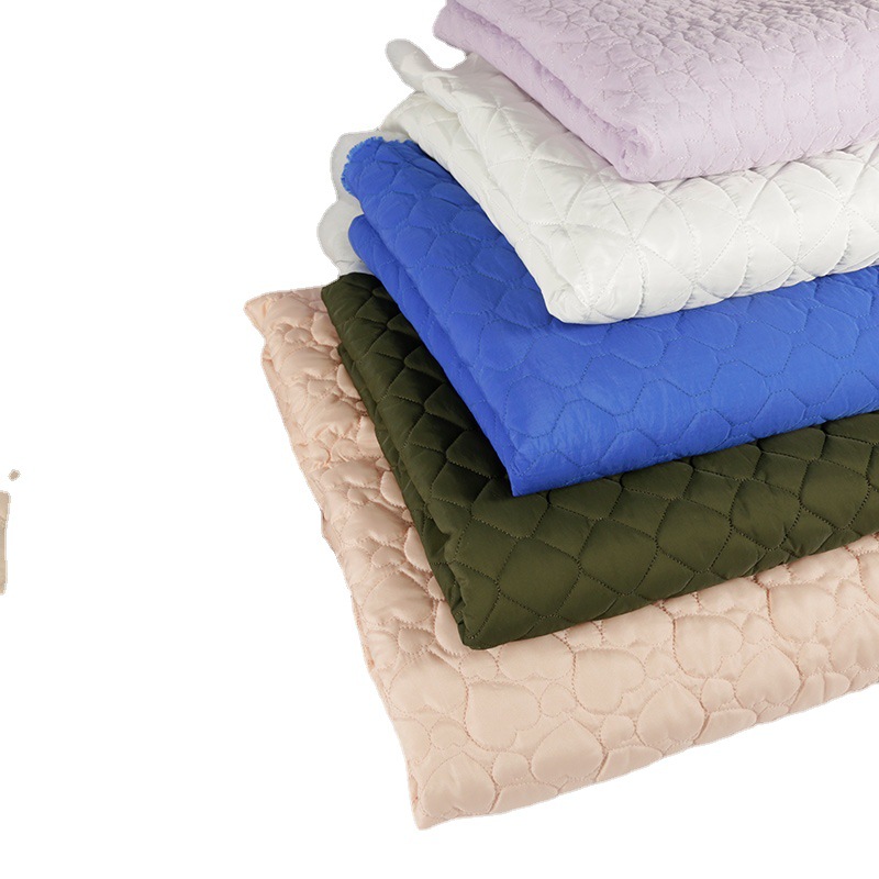 潮流绗绣绗棉面料 厂家批发 品质加棉菱形棉服服装面料 现货直供