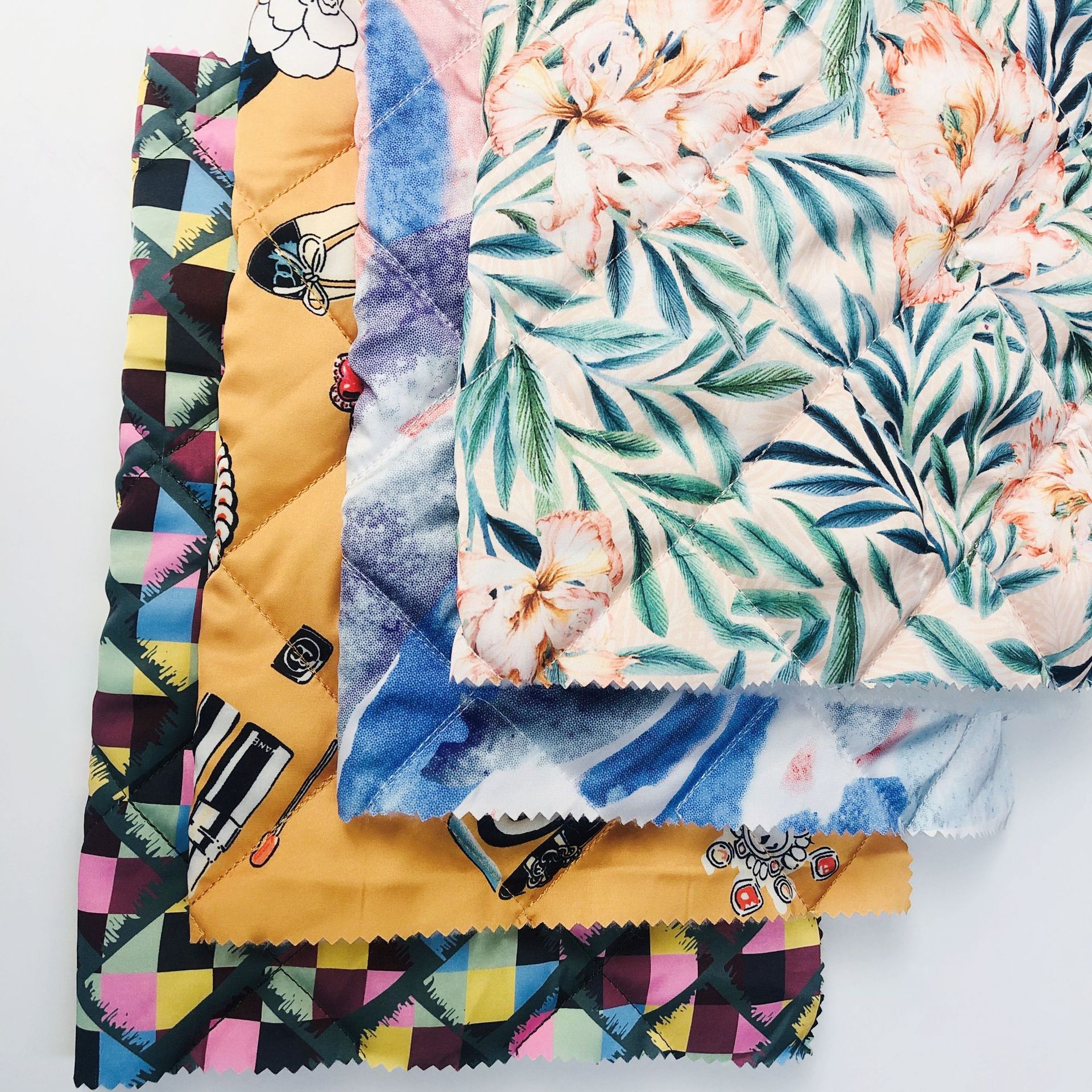 菱形格子仿真丝印花绗棉绣花 睡衣布料春秋外套缎面夹棉绗缝加工