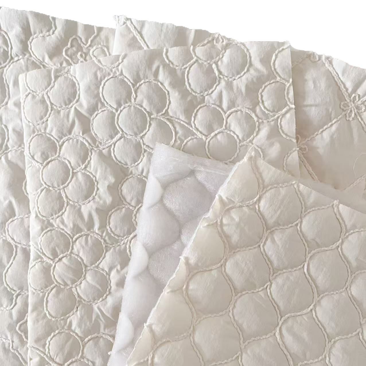 绳绣加粗线绗缝夹棉布立体绣花布云朵包服装夹克面料刺绣布绗绣