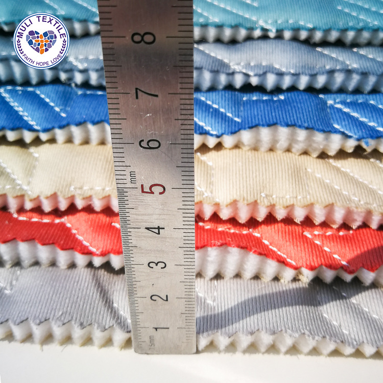 工厂直销 荷兰绒 千鸟格绗缝夹棉 防滑 烤火罩 沙发垫布料批发