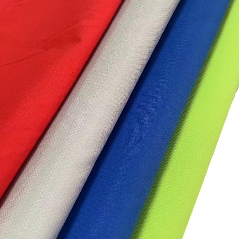 现货150G全涤平纹小蜂巢PU涂层复合针织布校服冲锋衣面料